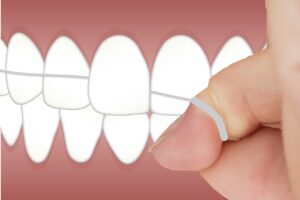 Jak używać nici dentystycznych?